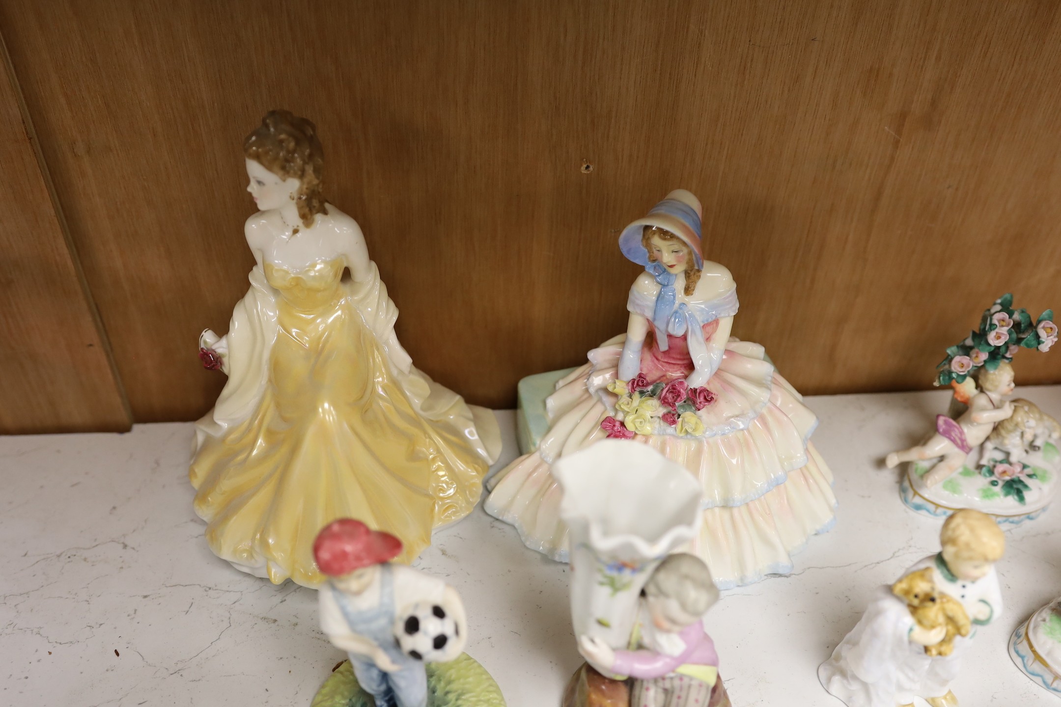 A selection of various miniature ceramics and figurines, to include Royal Crown Derby two handled vases with central panelled section display of flower, together with Royal Doulton figures, tallest 19cm